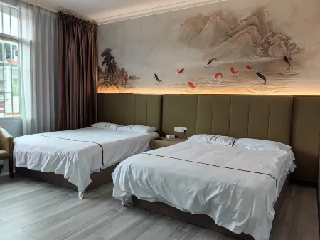 Liancheng Hexin Business Hotel Отели рядом с достопримечательностью «Peitian Ancient Village»