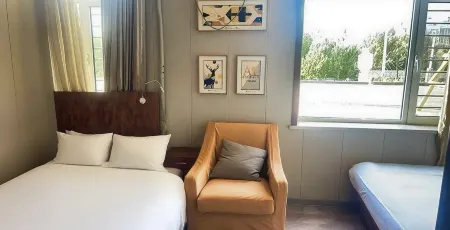 Xilehui Holiday Hotel Отели рядом с достопримечательностью «Liaoning Rail Transit Vocational College New Campus»