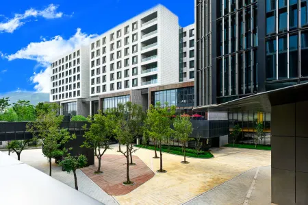 Yinbao Jianguo Hotel Отели рядом с достопримечательностью «Jingxi Wulituo Folk-custom Exhibition Hall»