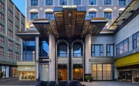 Huanyang E-Sports Hotel (Miluo Tiyu Lane)