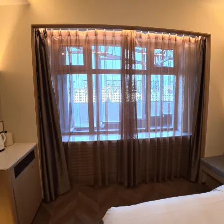 Jiuzhou International Hotel Отели в г. Хэган