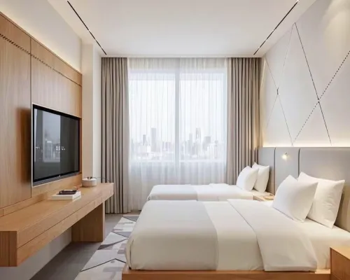 Sencai Hotel (Mengla Star Night Market) فنادق في منغ لا