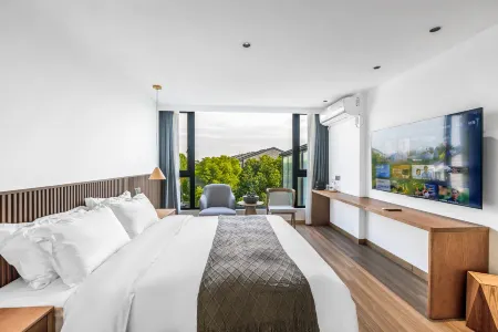 Qingqian-Su Boutique B&B (Shanghai Zhujiajiao Ancient Town) Отели рядом с достопримечательностью «Taohua Island»