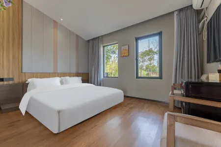 Floral Hotel · Cuntiansu Hotel Отели рядом с достопримечательностью «Chongming Xunyicao Theme Park»