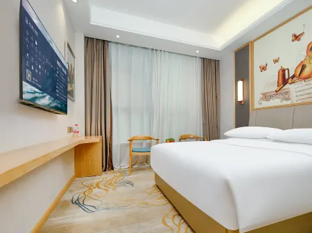 Vienna sanhao Hotel (Mianyang Zitong Huaxin Plaza) Отели рядом с достопримечательностью «Liangdancheng»