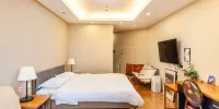 Youxi Deluxe Apartment Hotel (Tianjin Xiaobailou) - Geselecteerde Kamer (tweepersoonsbed)