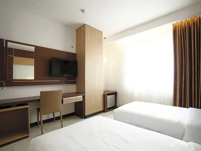 哈摩尼旅館 鄰近Teknik Informatika的酒店