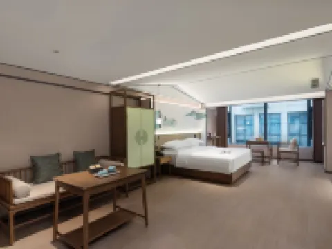 Mo Shang Qing Ju Hotel (Quliang Garment Industrial Park, South University Road, Zhengzhou) Hotel a Xinmi
