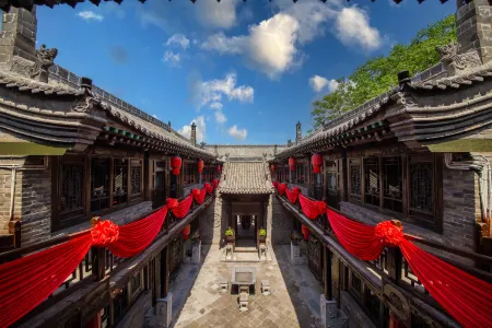 Four Seasons Boutique Inn (Pingyao Ancient City Ancient County Government Office) Отели рядом с достопримечательностью «Ming and Qing Dynasty Ancient Street»