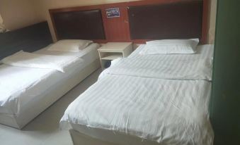 Qira Xinglong Hotel