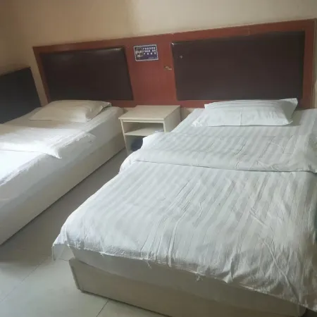 Qira Xinglong Hotel