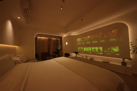 Suju Service Apartment (Shanghai International Tourism and Resorts Zone Zhoupu Wanda) Отели рядом с достопримечательностью «Shanghai Customs College»