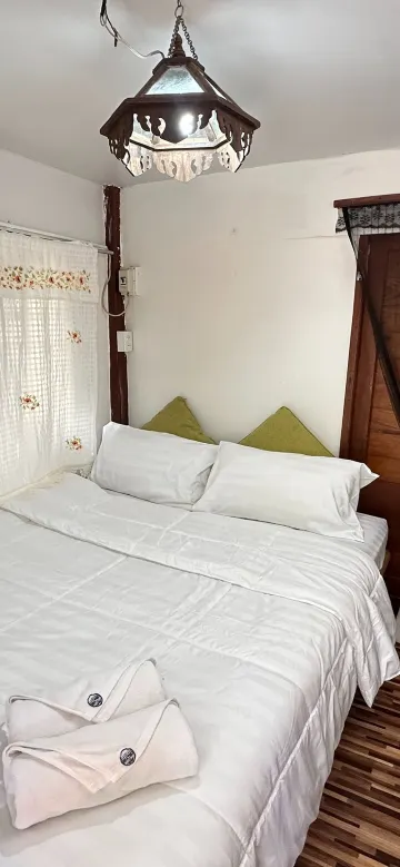 ห้องพักมาตรฐานเตียงเดี่ยวพร้อมเครื่องปรับอากาศ (ห้องน้ำส่วนตัว)