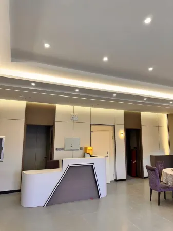 Chengcheng Hotel (Snow Town Erlanghe Scenic Area Branch) Отели рядом с достопримечательностью «Xuexiang National Forest Park»