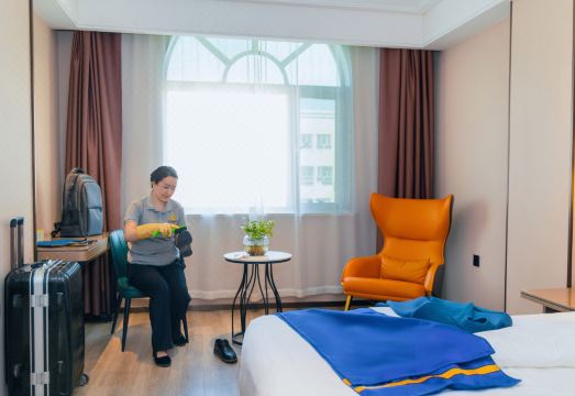 슈퍼 8 호텔의 깔끔하게 정리된 침구