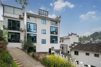 Wuyuan Guling Yunshangshangju Suites Hotel dekat Huang Hill