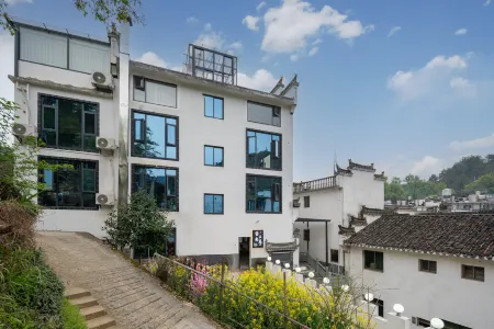 Wuyuan Guling Yunshangshangju Suites Отели в г. Уюань