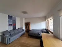Cozy apartment - 100m beach, AC, workstation, balcony, backyard, yoga mat Hotels in Babite parish