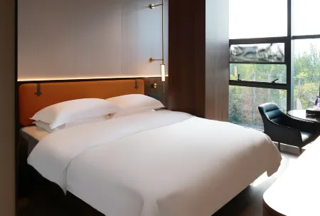 Jinlanting Hotel (Jinzhou Beizhen Bus Station) Отели в г. Бейчжэнь