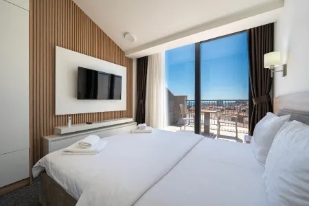 Rooftop Apartments & Rooms Отели в г. Подострог