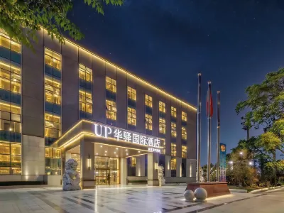 UP Huayi International Hotel Отели рядом с достопримечательностью «Дун Ши Парк»