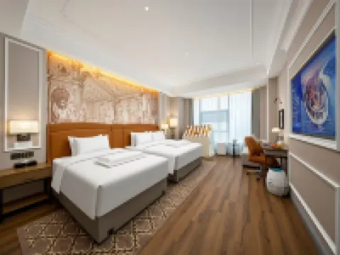 Vienna International Hotel (Heze Shan Development Zone Shunshi Building)