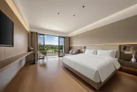 Xinhu Bay Resort Hotel (Chuxiong Xinghai Lake High-speed Rail Station Branch) - Balcony