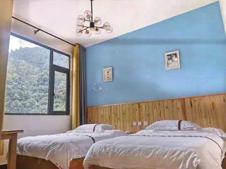 Tianquan Yaju Yijing Inn Отели рядом с достопримечательностью «Erlang Mountain National Forest Park»