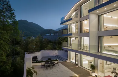 JANE Hot Spring Hotel (Anji Yunshang Grassland Panda Tribe Adventure Park Branch) Отели рядом с достопримечательностью «wu he cun»