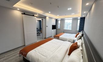 Qingdao Chujian. Yijia Preferred Hotel (Golden Beach Wuyue Plaza)