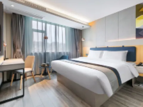 โรงแรมบิซิเนส ทราเวล ชิว (สาขารัฐบาลเขตเป่าหยิง) โรงแรมในเป่าหยิง