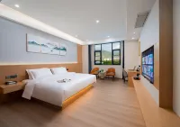 Xinyue Intelligent Hotel (Yuanjiang Bus Station Branch) Hotels near Riyuehong Shopping Mall