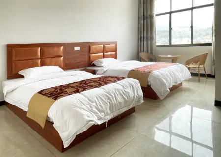 Luoping Jinlingfeng Haitang Station Отели в г. Луопинсянь