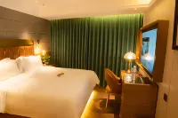 James Joyce Coffetel (Guangyuan Totem Square) Hotels near Huangzesi