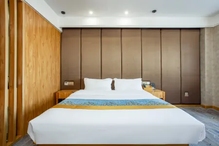 Suqian Yunlan Manju Hotel (Baolong Plaza Bus Terminal) Отели рядом с достопримечательностью «Nanhailu Theme Square»