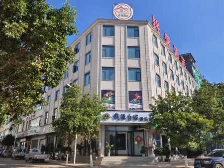 Qianyuan Hotel, Luxi Отели в г. Луси