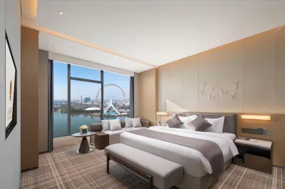 南歸飯店(佛山世紀蓮體育中心東平地鐵站店) 世紀蓮游泳跳水館附近的飯店