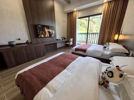 Uh mile homestay Отели рядом с достопримечательностью «Baimazhai Village»