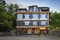 Huashen · Yunshu Designer Hotel (Lijiang Ancient City Waterwheel Store) Hotel di Beimenpo