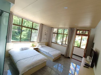Yebai Chinese Inn Hotels near Guan'E Gou Scenic Area