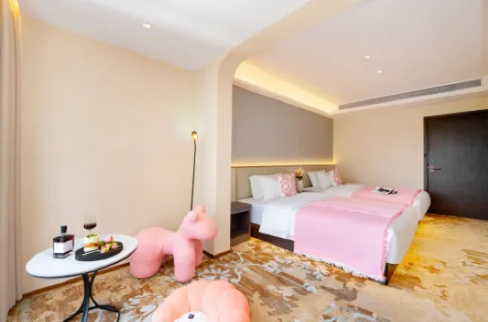 海岸酒店（西雙版納景洪告莊西雙景星光夜市店）