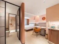 Orange Hotel (Quanzhou Xijie Jiuyi Street Branch) Hotel dekat Qingjing Temple