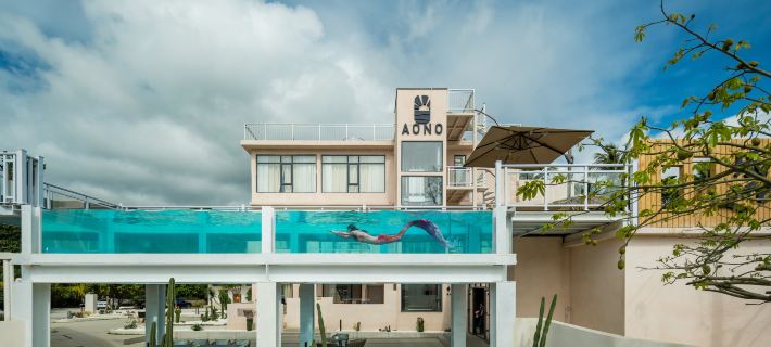 Qingye AONO Surf Design Meisu (Wanning Riyuewan Branch) Отели в г. Ваннинг