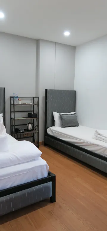 ห้องเตียงแฝด พร้อมห้องน้ำรวม