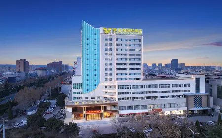 Vienna International Hotel (Sanmenxia Lingbao Hangu Road Municipal Government Branch) Отели в г. Линбао