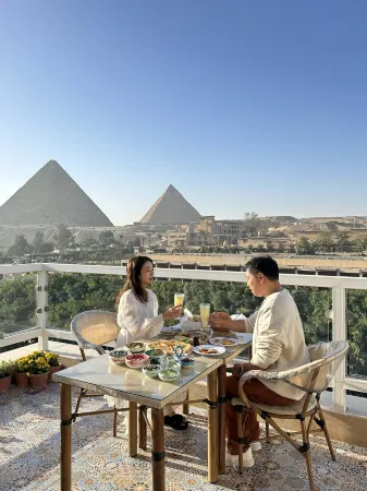 Doudou Pyramids View Hotel Отели в г. Kafr Nassar