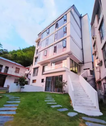 qing yuan yuan she Отели рядом с достопримечательностью «Tianlongjiupu»