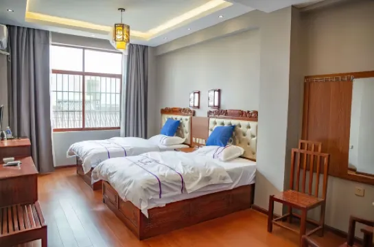 Yuchuan Enguo Guest House - موقف سيارات
