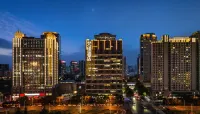 Fanjin Hotel (Zhengzhou Convention and Exhibition Center Subway Station Branch) Отели рядом с достопримечательностью «Хэнаньский университет открытия»