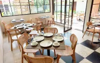 WAKAYAPA Syariah Residence Managed by Bumikarsa Bidakara - breakfast